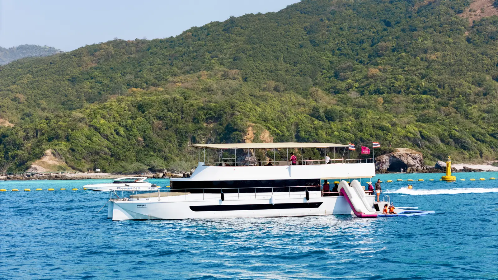 OCEAN ODYSSEY, a 63ft motor catamaran, cruising off Pattaya